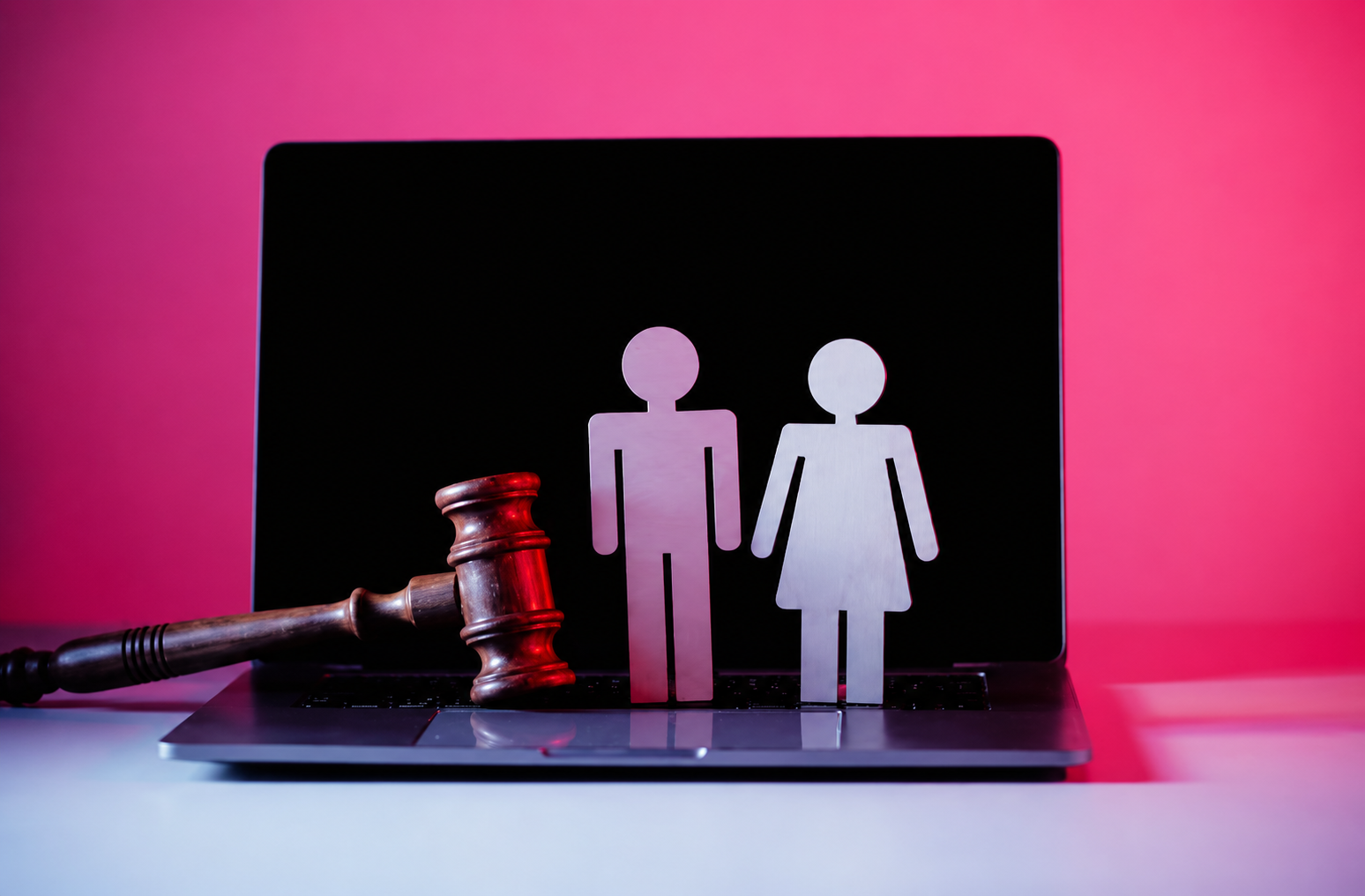 Judge’s gavel and family law symbols displayed on a laptop screen, representing digital marketing strategies for divorce lawyers targeting qualified family law cases and Hispanic clients.